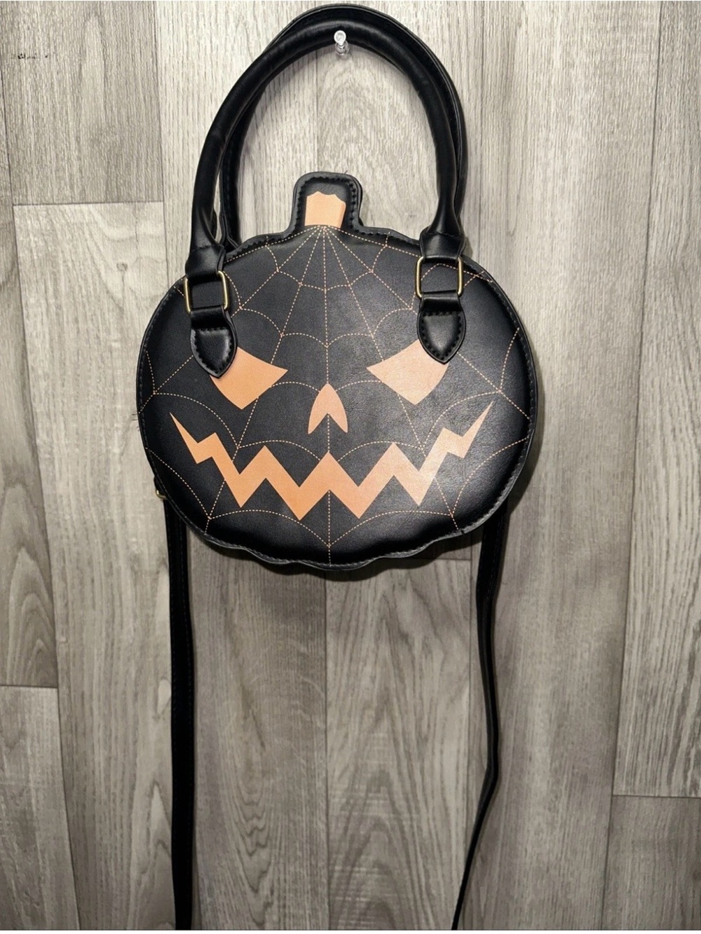Source Unknown Black Round Pumpkin Face Crossbody Bag with Orange Accents